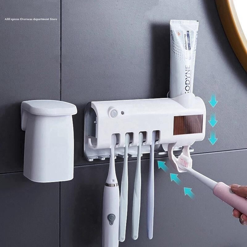Asronix esterilizador UV 3 en 1 de pared con dispensador de pasta y capacidad para 5 cepillos de dientes.