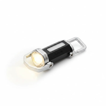 Linterna Asronix multifunción negra y plateada con luz LED y COB, recargable por USB, ideal para camping y emergencias.